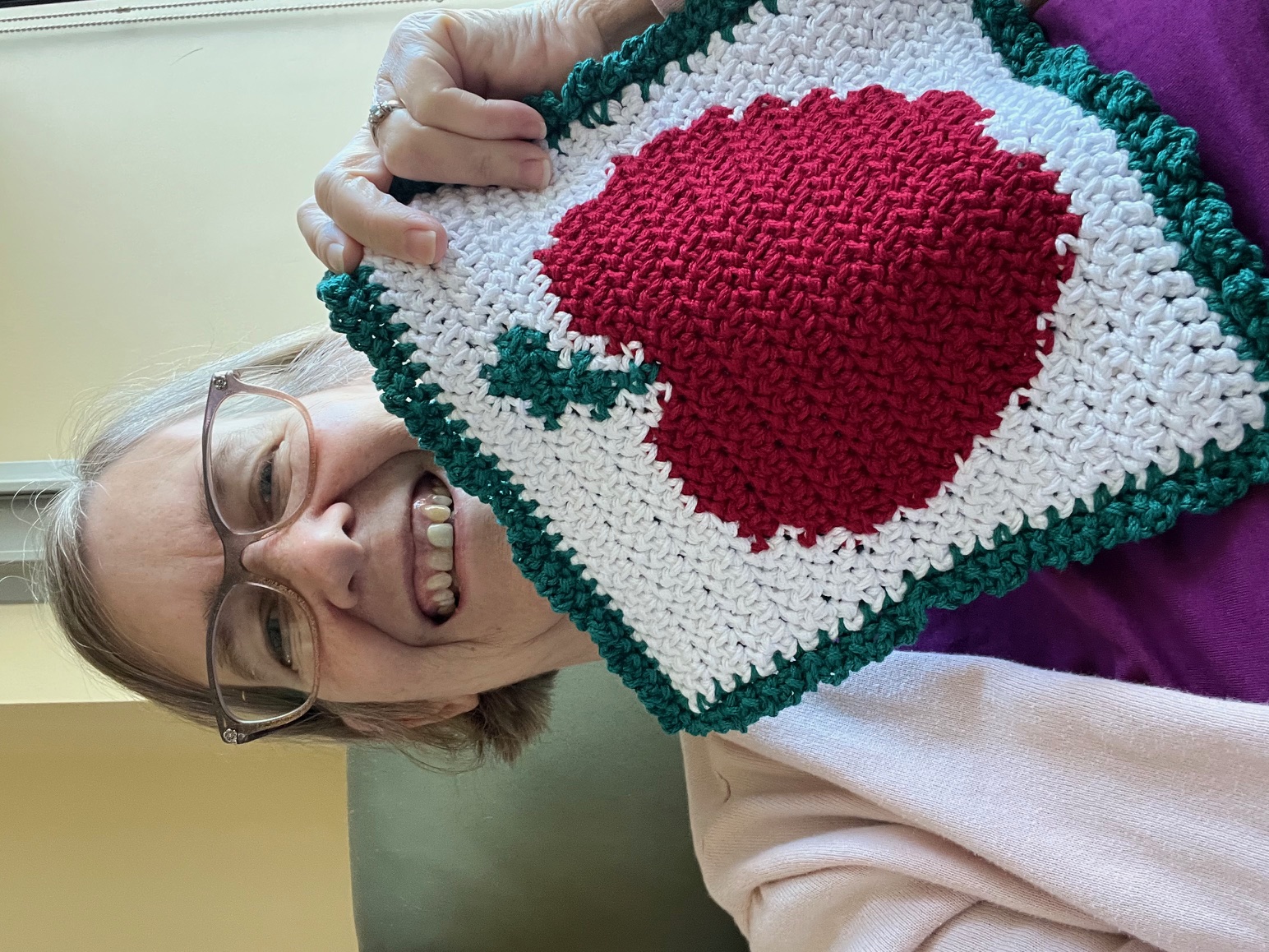 Jill Zitzewitz with a knitted heart
